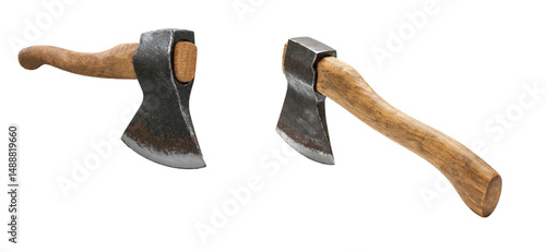 Two old axes with wooden handles. Vintage hand axes for cutting wood