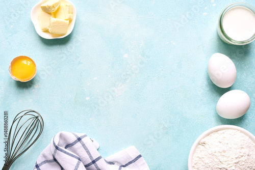 Culinary background with ingredients for baking : flour, egg and sugar . Top view with copy space.