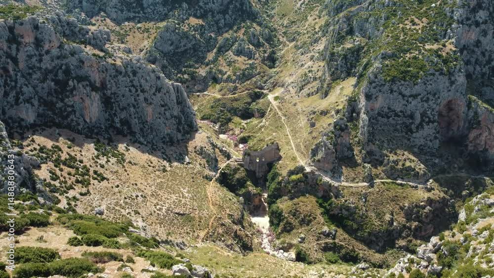 The legendary Demirkapı pass in the heart of the Amanos Mountains. The breathtaking view of this steep canyon that has been a route for armies, caravans and travelers for thousands of years. The legendary Demirkapı pass in the heart of the Amanos Mountains. The breathtaking view of this steep canyon that has been a route for armies, caravans and travelers for thousands of years.
