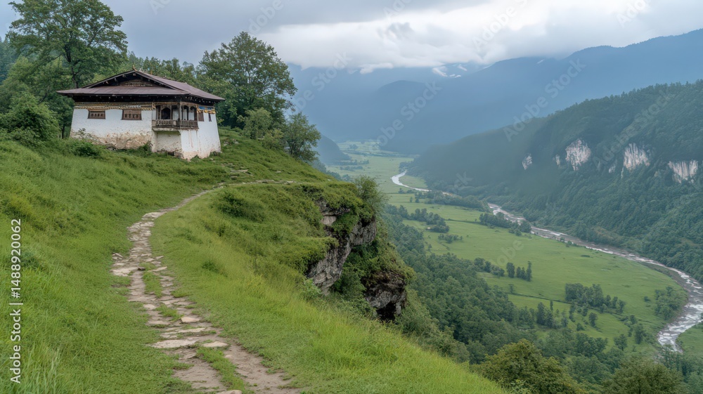 Obraz premium Scenic Mountain Monastery on a High Cliff overlooking a Lush Green Valley