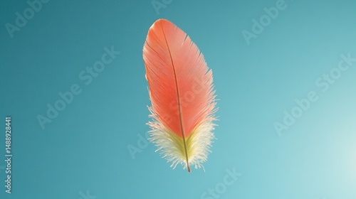 Obraz na płótnie Single coral-pink feather against pale turquoise background w salonie