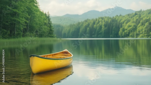 Yellow Canoe on a Tranquil Mountain Lake