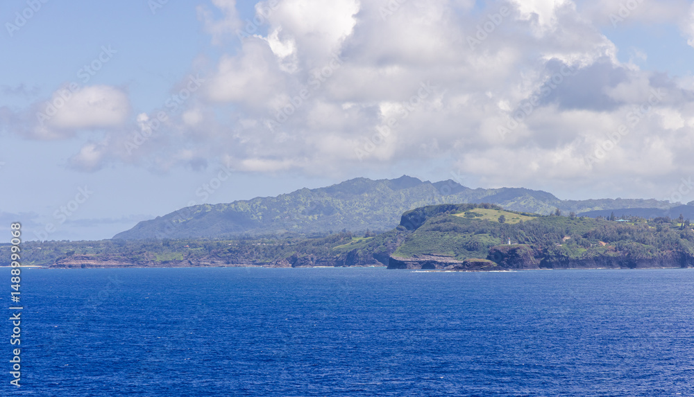 Scenic View of the NaPali Coast on Kauai, Hawaii with Bright Blue Ocean Scenic View of the NaPali Coast on Kauai, Hawaii with Bright Blue Ocean