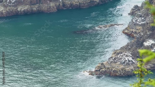 4K footage shows La Bufadora, a powerful marine geyser on the Baja California coast in Mexico, near Ensenada. The geyser blasts ocean water over 60 feet into the air along rugged cliffs.