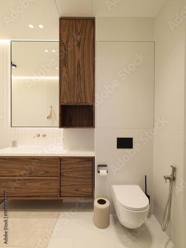 A modern minimalist bathroom design featuring elegant and stylish fixtures is essential