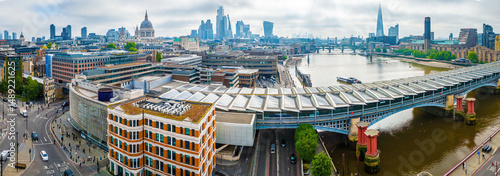 Photography Aerial view of Blackfriars station with solar panels on the roof, London skyline and St