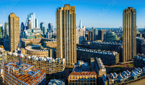 Canvas Print Colorful aerial view of London's Barbican Estate with high-rise buildings, moder