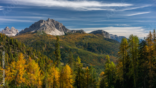 Fototapeta Naklejka Na Ścianę i Meble -  The specular landscape of Sorapis trail between hike to lake in Autumn season, Dolomite, Italy.