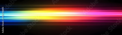 Horizontal multicolored light streaks on dark background