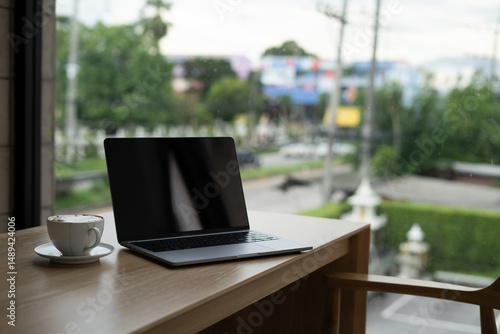Wallpaper Mural Laptop and coffee on the table. Work from home concept. Torontodigital.ca