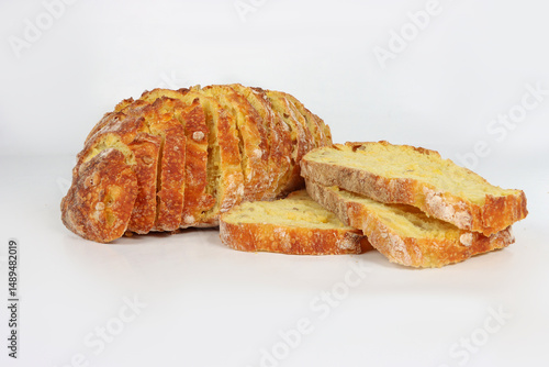 Sliced corn bread isolated on a white background. Golden crust and soft yellow interior