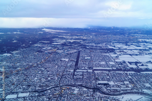新千歳空港離陸後見える風景　冬の千歳市