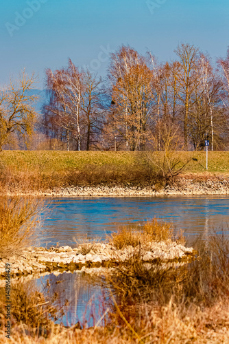 Spring landscape with reflections on a sunny day at Muehlham, Osterhofen, Deggendorf,Bavaria, Germany