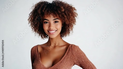 Radiant beauty of a graceful woman. She has her own style and the smile she gave makes people feel happy. The image capture a person's natural confidence and happiness.