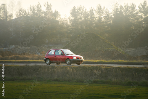 Compact European vehicle in motion outdoors