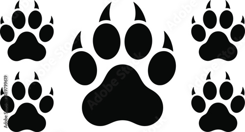Big cat paw prints black silhouettes set