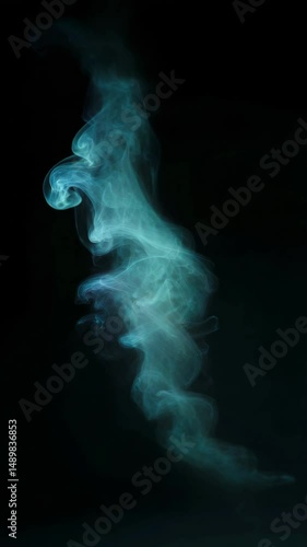 Abstract ethereal teal colored smoke patterns swirling gently against a stark black background, creating a moody, artistic visual element