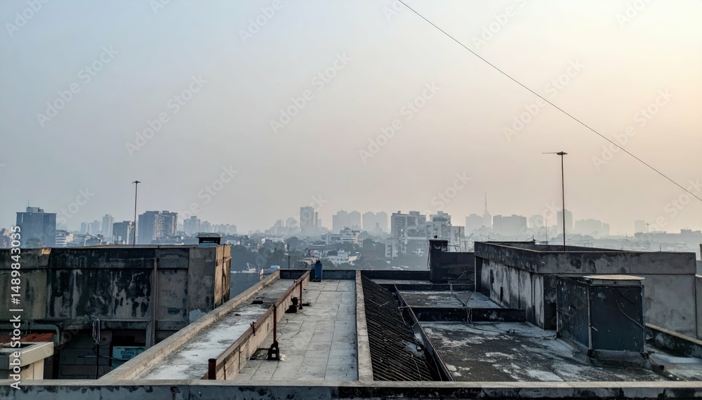 Obraz premium Atmospheric Rooftop View with Distant Buildings Under Soft Light