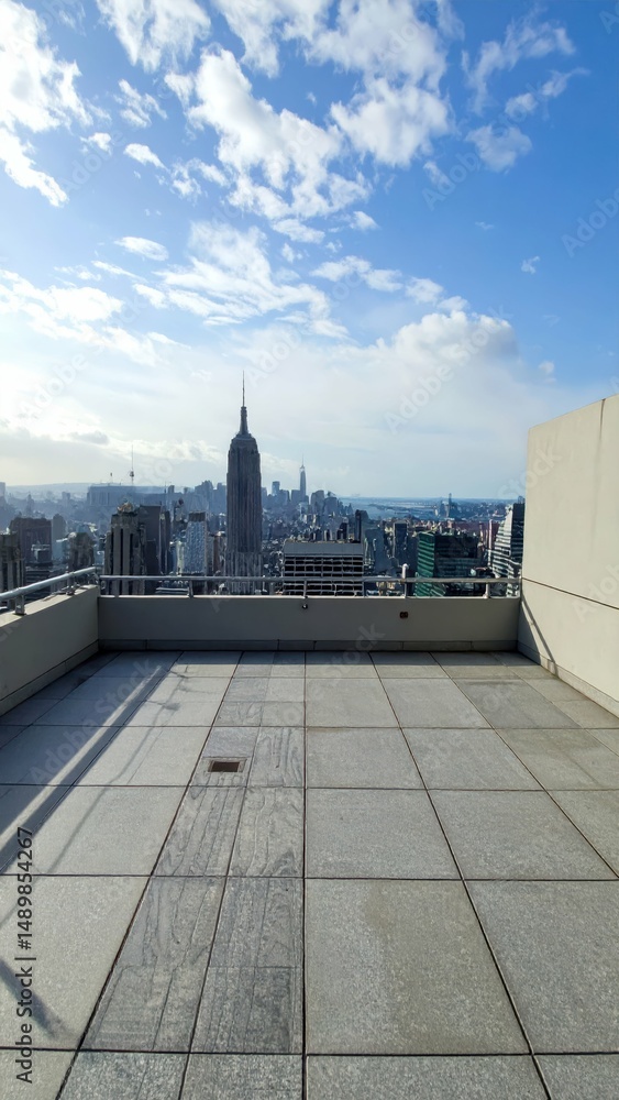 Naklejka premium Rooftop Viewpoint Showcasing Cityscape and Urban Connection Below