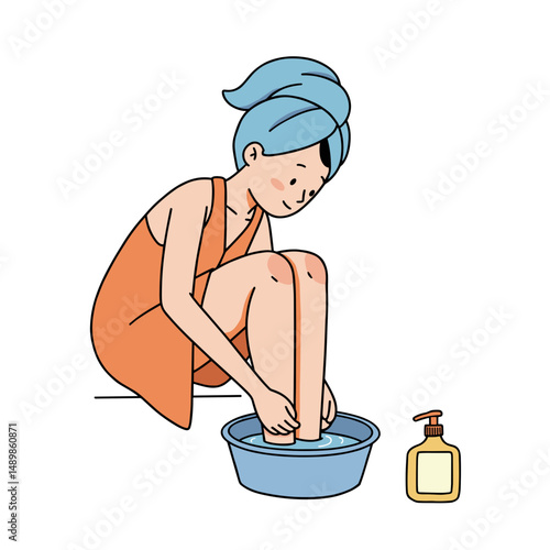 Woman soaking feet in a basin while relaxing at home with a towel on her head