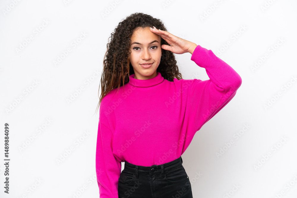 Young Arab woman isolated on white background saluting with hand with happy expression Young Arab woman isolated on white background saluting with hand with happy expression