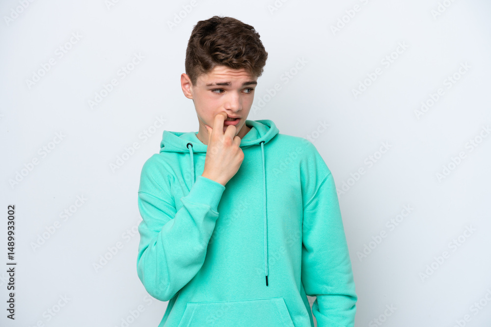 Teenager Russian man isolated on white background nervous and scared Teenager Russian man isolated on white background nervous and scared