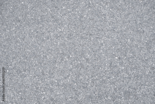 Concrete road surface photographed from above for a light gray background.