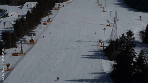 Aerial view of skiers on a winter slope