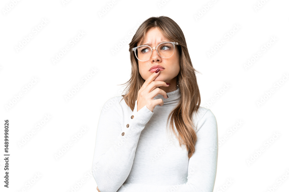 Young girl over isolated chroma key background With glasses and having doubts Young girl over isolated chroma key background With glasses and having doubts