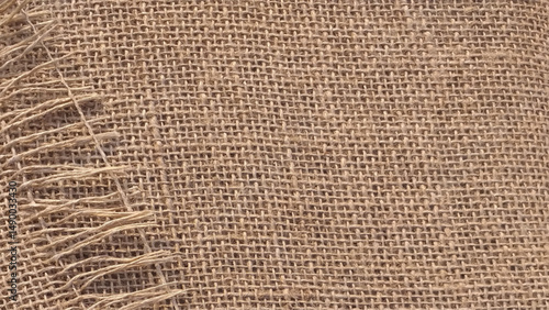 Jute pattern, rough burlap texture, canvas coarse cloth, brown woven rustic bagging. Natural hessian beige textile texture. Linen fabric backdrop. 