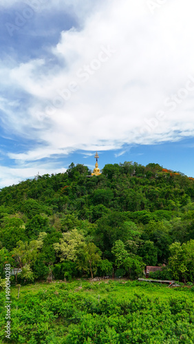 Buriram's Pride. Phra Suphattharabophit and the Stunning Landscape of Khao Kradong, buddha statue in thailand.