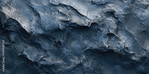 Wallpaper Mural Close-up view of a dark, textured rock face Torontodigital.ca