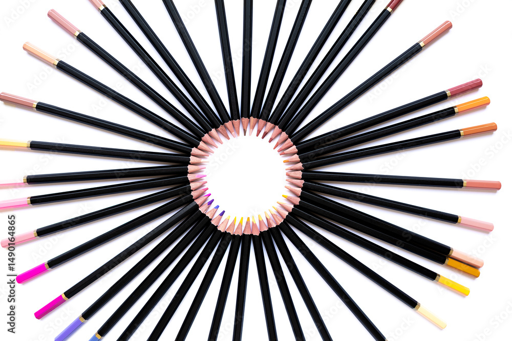 Obraz premium Bright colored pencils forming a perfect circle on a clean white background, top view. A creative and artistic composition with soft focus, symbolizing color and harmony.