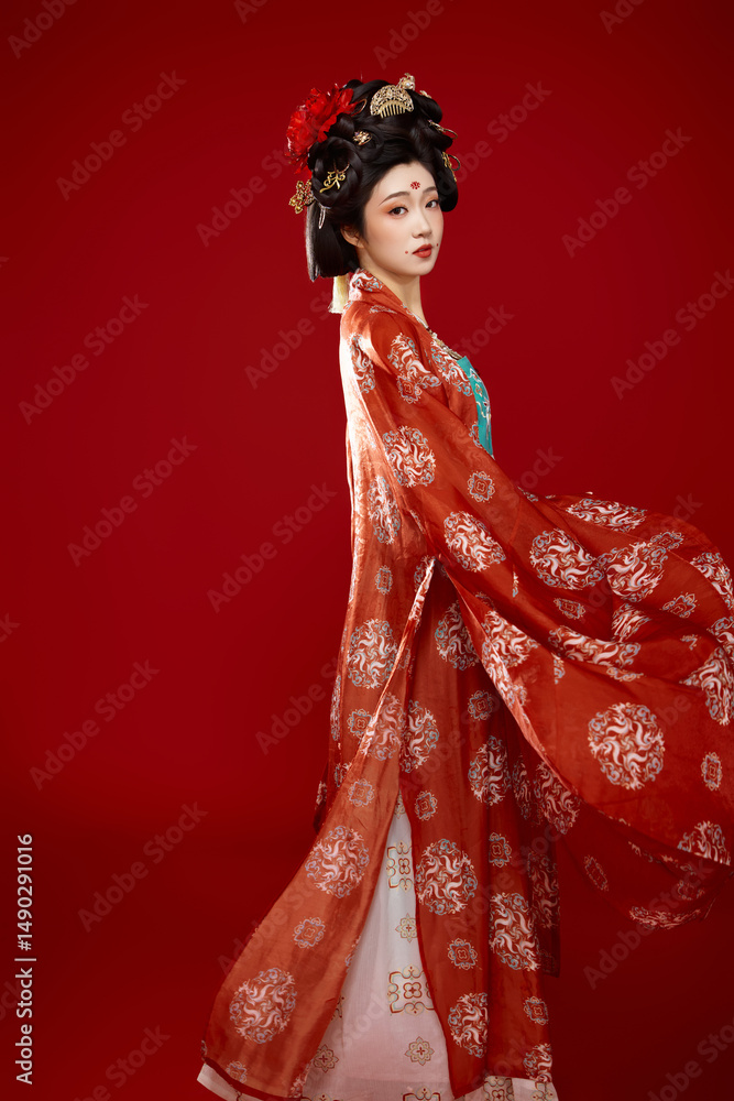 Tang Dynasty style female ancient costume makeup modeling on red background Tang Dynasty style female ancient costume makeup modeling on red background