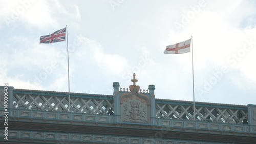 Union Jack and England Flag Flying Above Tower Bridge