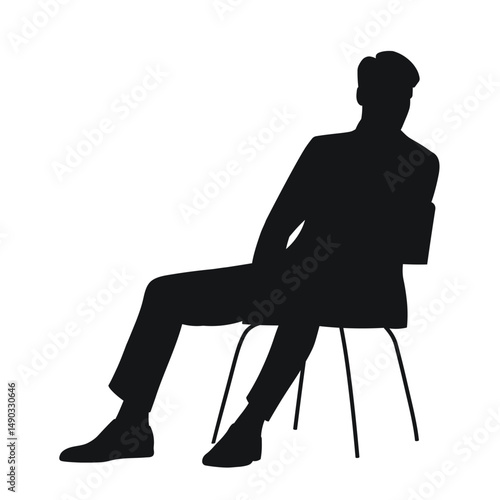 Slender guy sitting, turning back, black silhouette