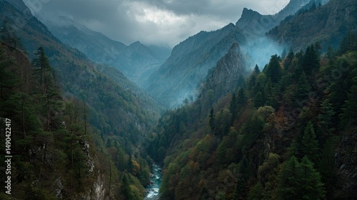 Majestic Mountains Embrace the Tranquil Valley Mist