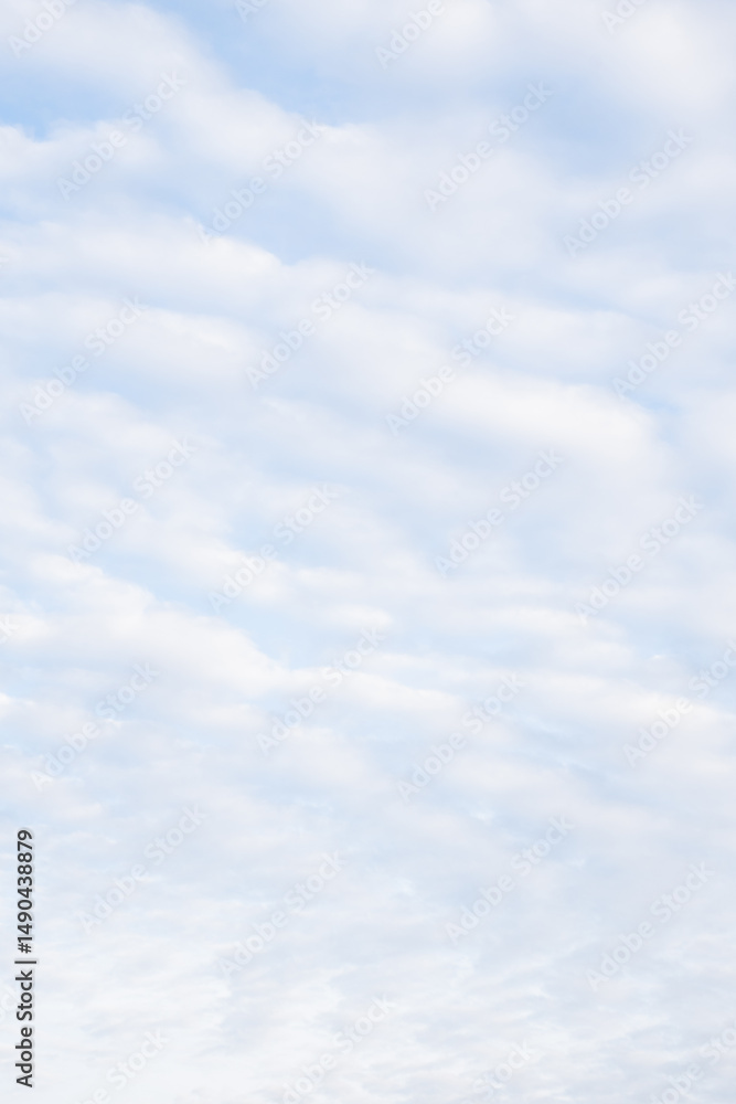 Obraz premium Wooden table surface with a scenic blue sky and fluffy clouds in the background, perfect for natural product displays or outdoor-themed designs.
