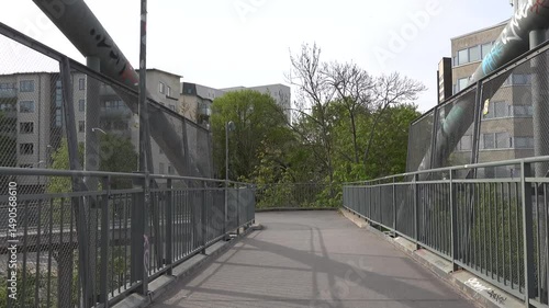 Wallpaper Mural Stockholm, Sweden The view from a bicycle riding over a pedestrian and bicycle bridge.  Torontodigital.ca