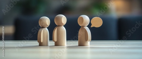 Wooden figure standing out among a group of diverse individuals, conversation concept, Wooden figurine with dialogue bubble, 
