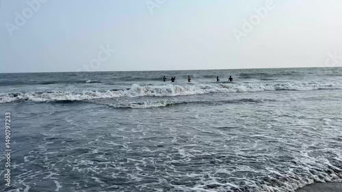 waves breaking on the beach