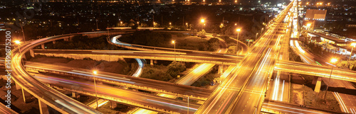Expressway, Self-driving autonomous electric cars of the future with HUD elements move along a busy traffic intersection. Concept: Artificial Intelligence, Car Scan, GPS Tracking, Smart Roads, IoT