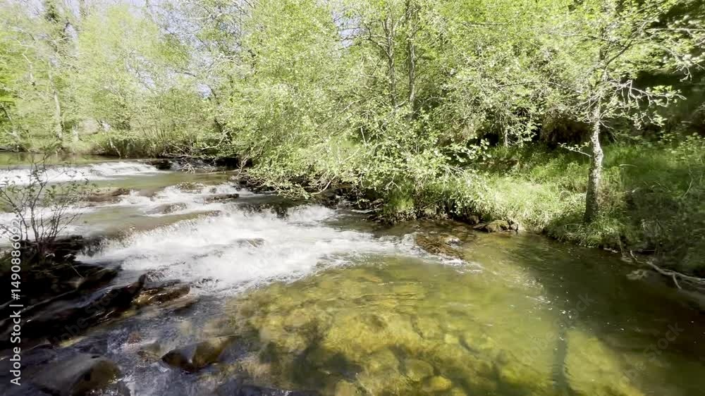 Beautiful fresh water area to swimming in the summer with waterfalls Beautiful fresh water area to swimming in the summer with waterfalls
