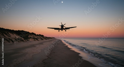 Silhouette of small plane landing over a tranquil beach at sunset.