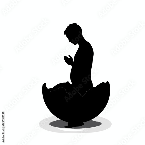 Silhouette of a man emerging from an eggshell in a contemplative pose  