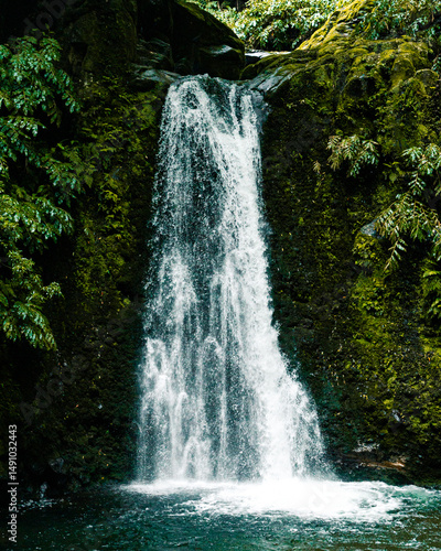 Waterfall in the Lush Green Landscape of the Azores Islands, Portugal