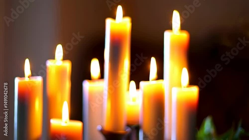 Wallpaper Mural Burning candles glowing with bright flames creating a soft, warm light against a dark background, arranged closely together, indoor scene creates a peaceful and serene atmosphere Torontodigital.ca