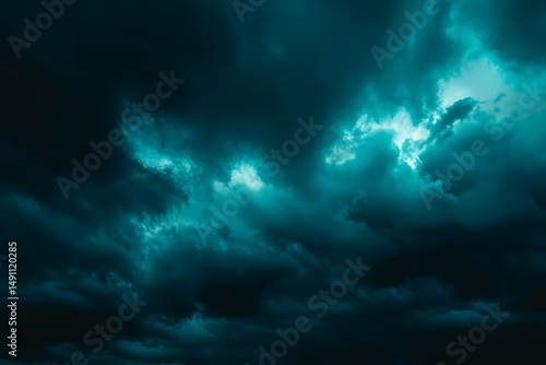 Fototapeta Naklejka Na Ścianę i Meble -  Black green blue night sky with clouds. Dark dramatic skies background for design. Cloudy, rainy, windy, stormy weather. Or a frightening, spooky, creepy, nightmare concept.

