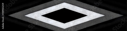 Abstract Diamond Pattern: A captivating image featuring a geometric diamond pattern in shades of grey and black, creating a visually striking and modern design. 
