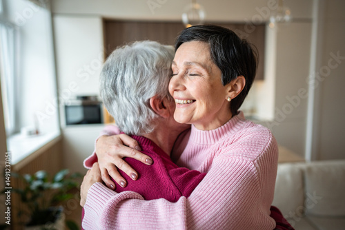 Joyful serene happy woman lovingly embraces husband, celebrating reunion after separation. Holiday greetings, strong family bonds, trust and warmth in relationship, emotional connection and support